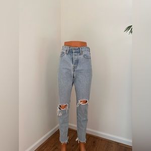 Levi’s ripped baby blue jeans